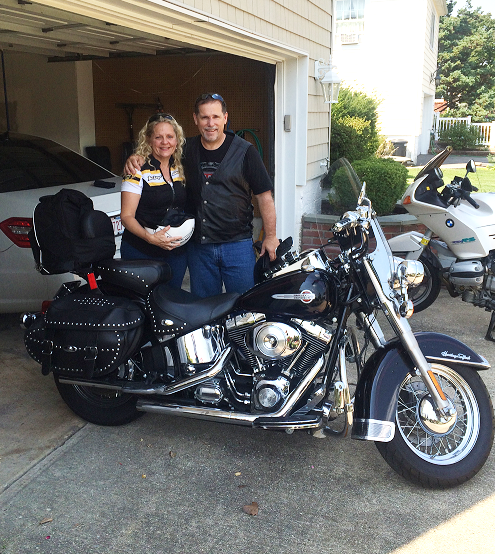 Michael and his wife Geina with their Harley Davidson Heritage Classic Softail